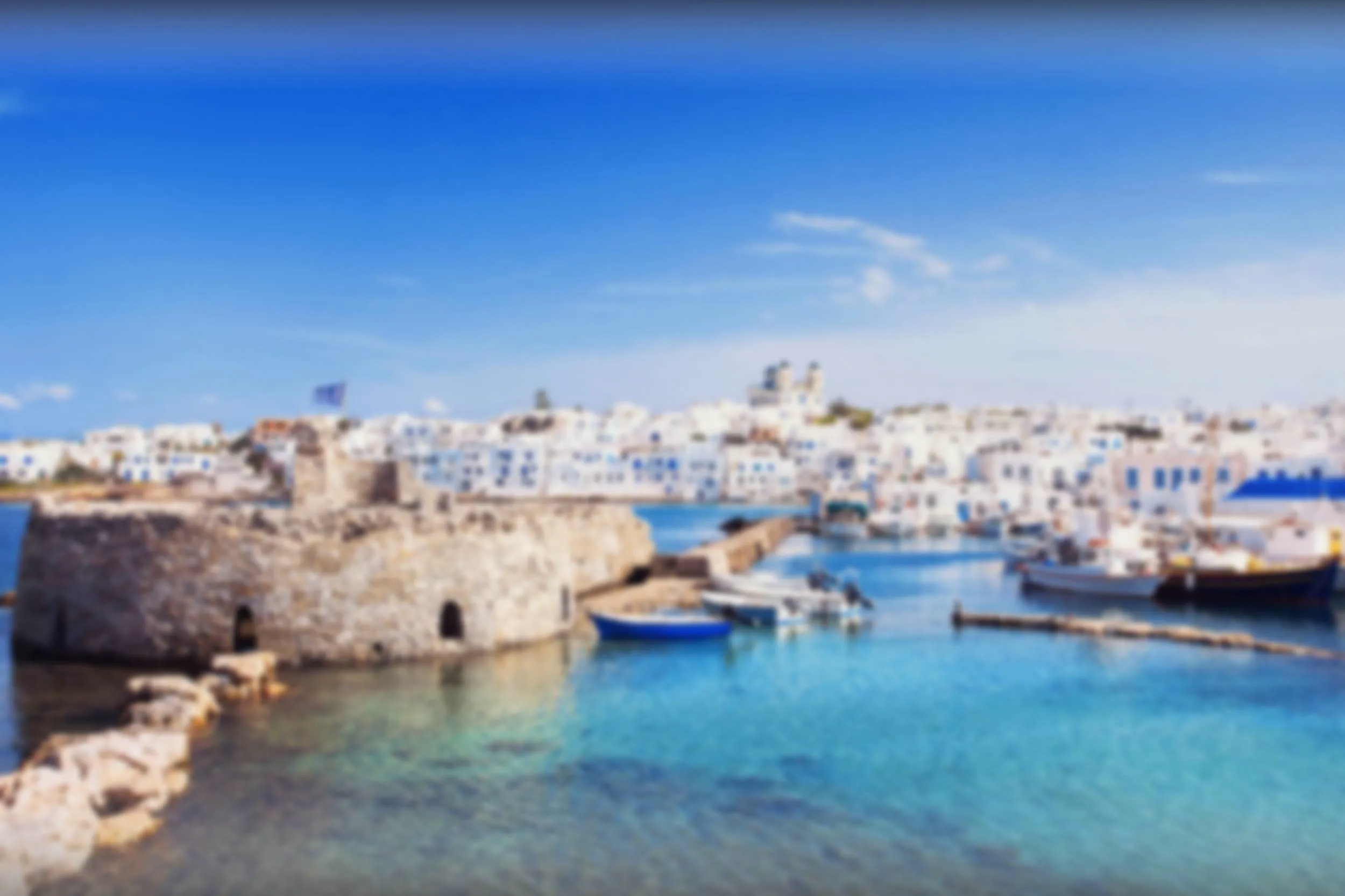 Person using Routey app on a smartphone while exploring Paros