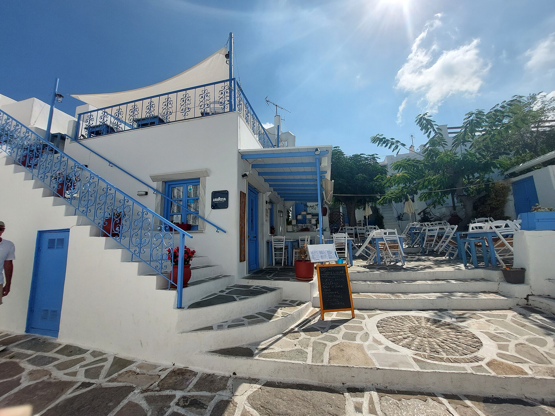 Blue-and-white alley in the mountain village of Lefkes, Paros