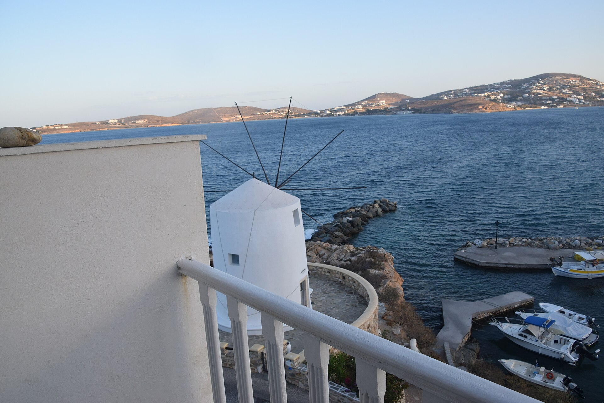 Ferries and whitewashed buildings at Parikia port, Paros
